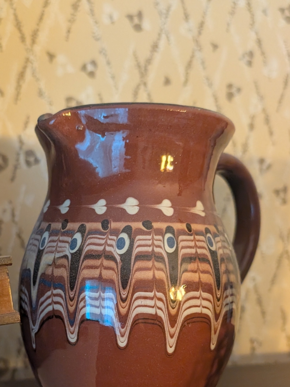 Brown Decorative Ceramic Pitcher with Patterned Band